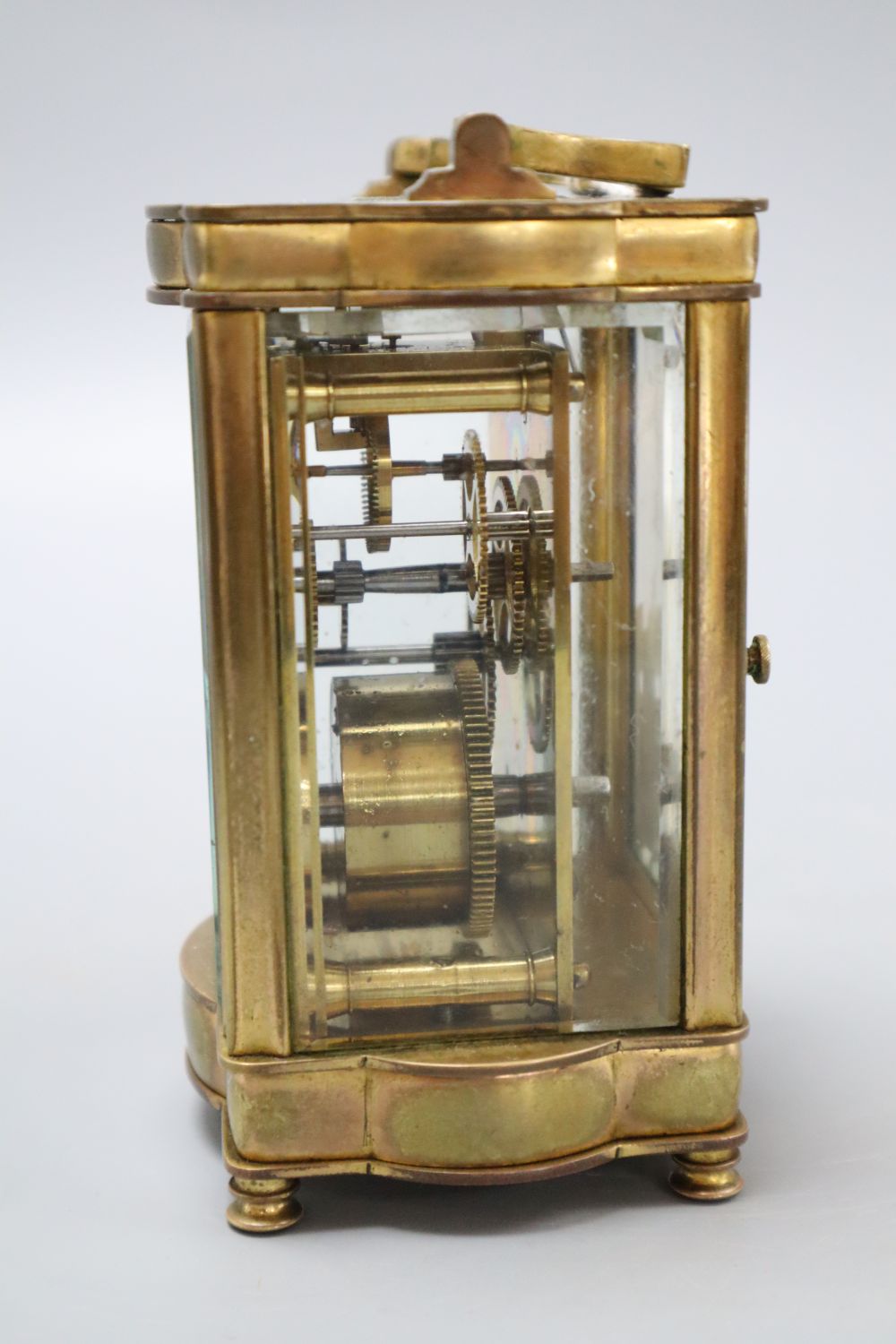 A brass cased carriage timepiece